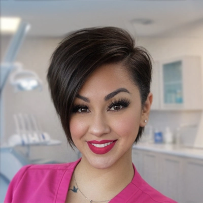 Rosie smiling at camera in dental room